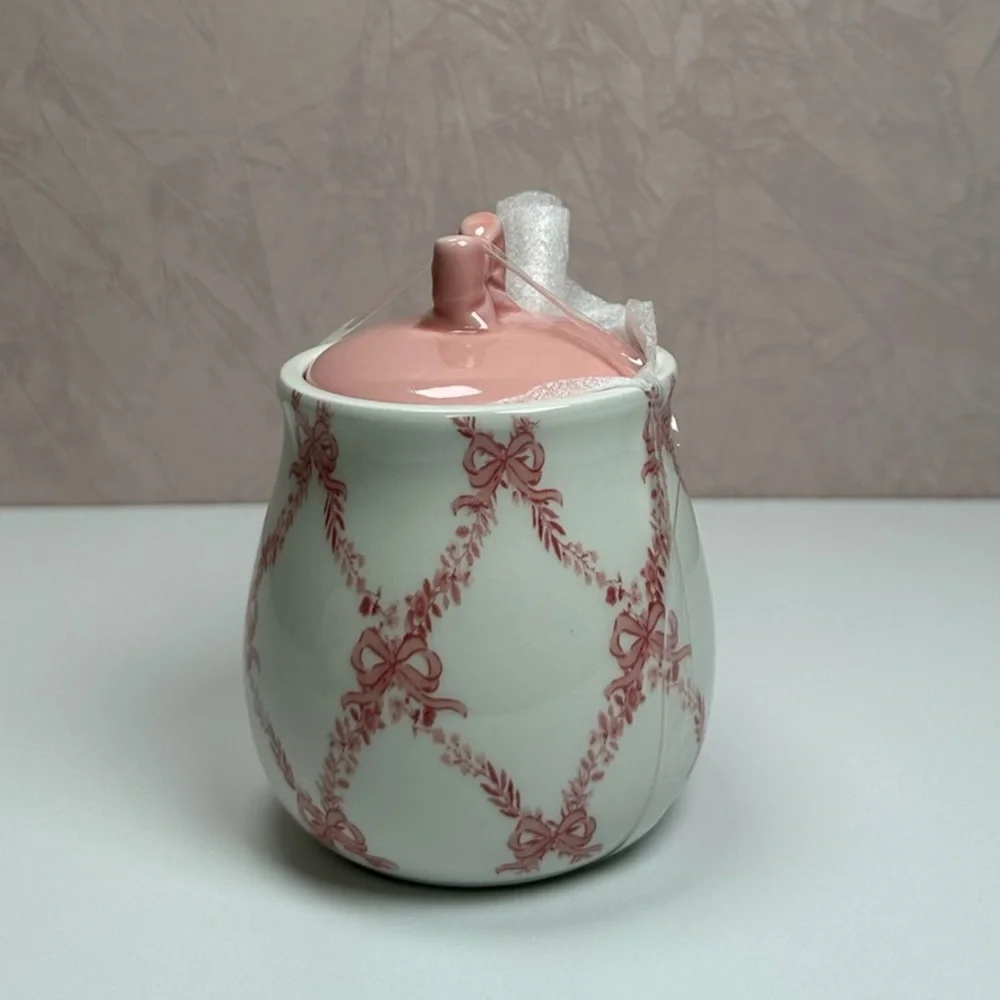 Elegant Pink and White Ceramic Sugar Bowl with Bow Accents